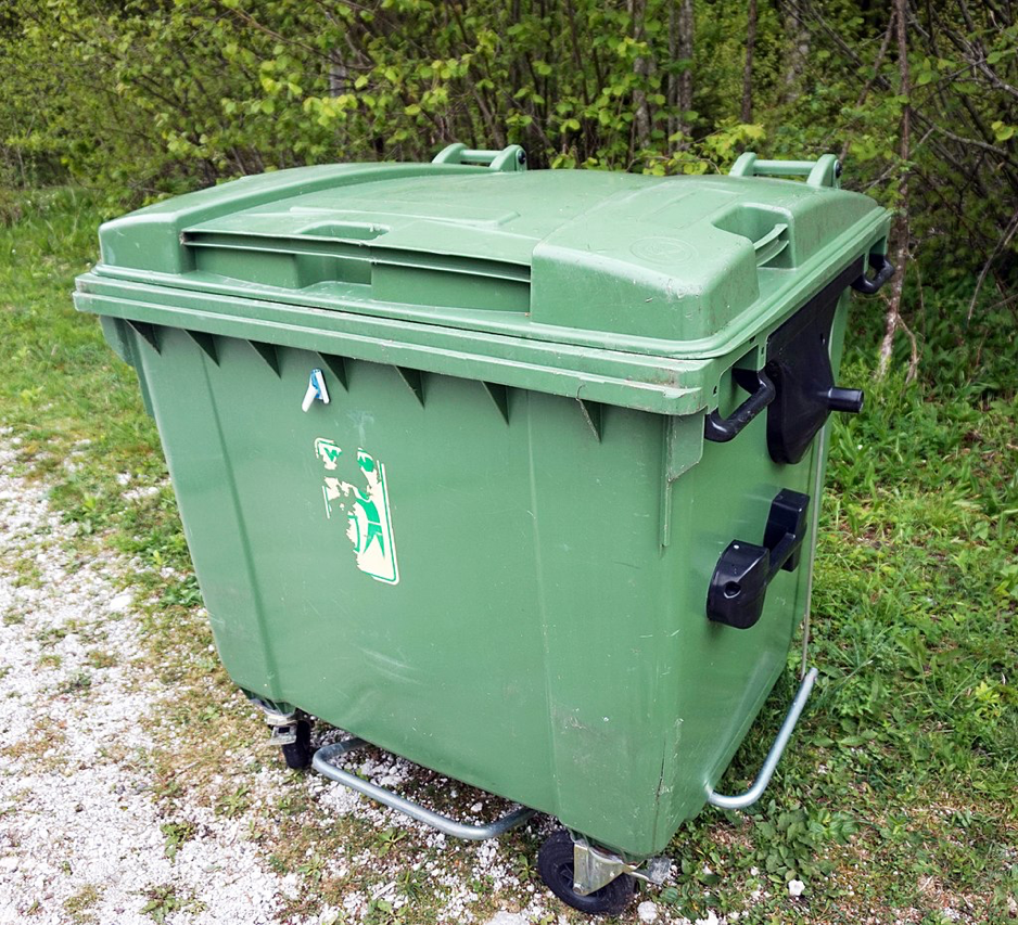 Sealed green trash bin